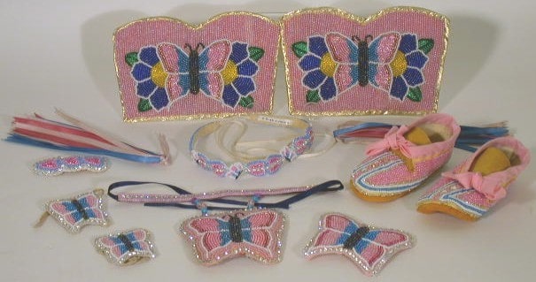 Pink and blue beaded accessories - shoes, hair pieces, leg panels and ribbons.
