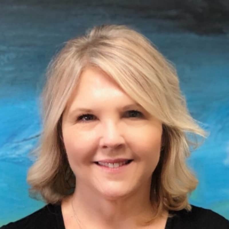 Picture of Roxanne who is the Director of Administration at the WDM.