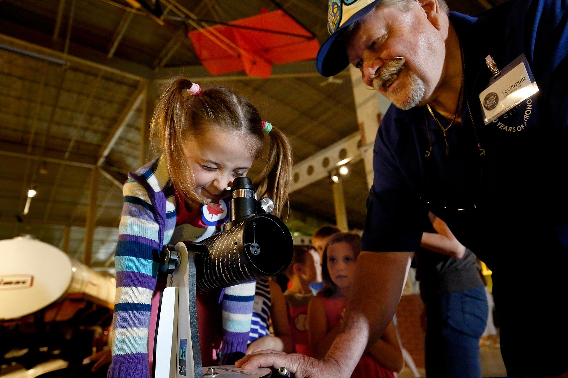 A Volunteer with kids at western development museum (WDM)