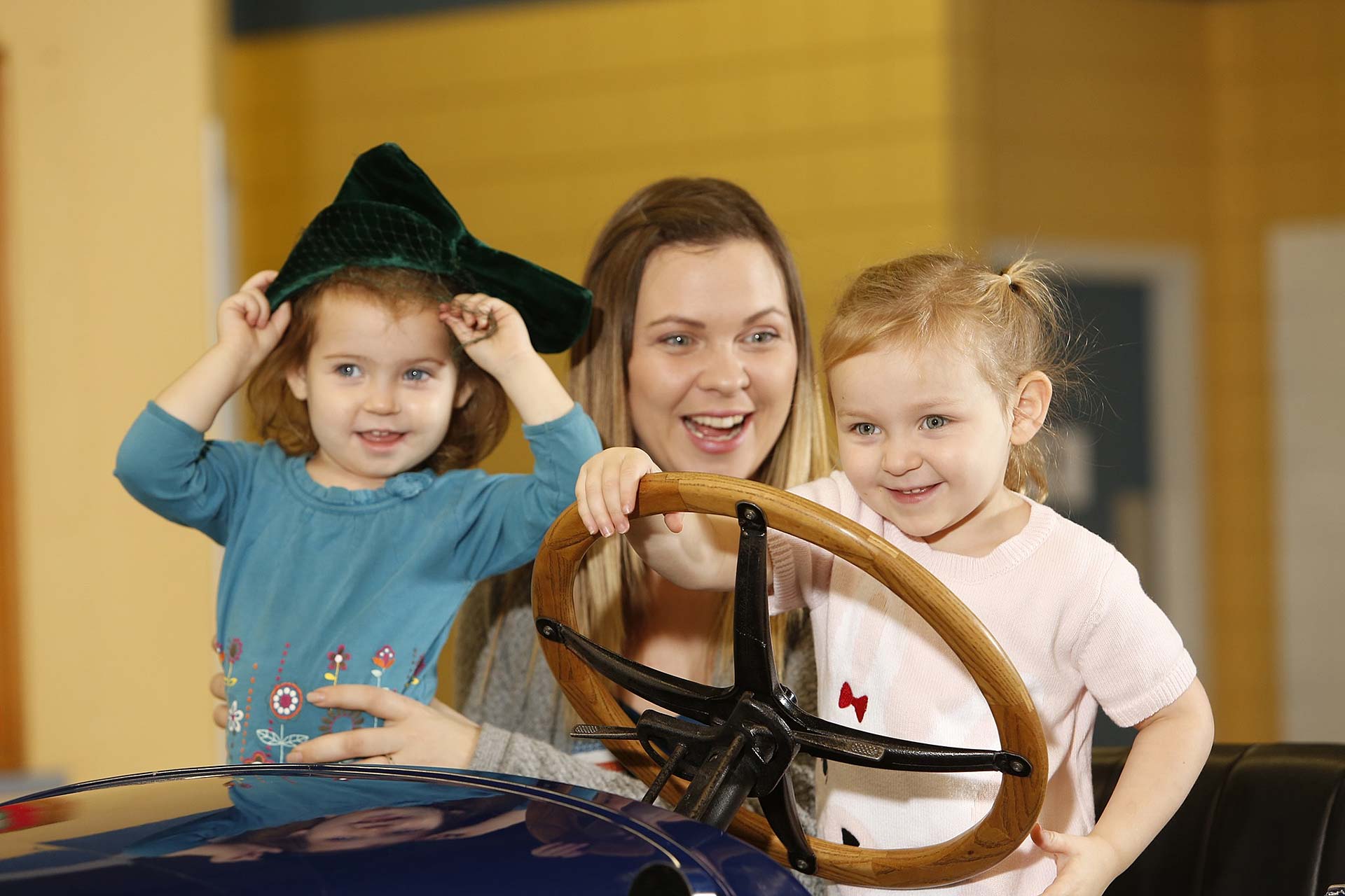 Family in WDM vehicle exhibit