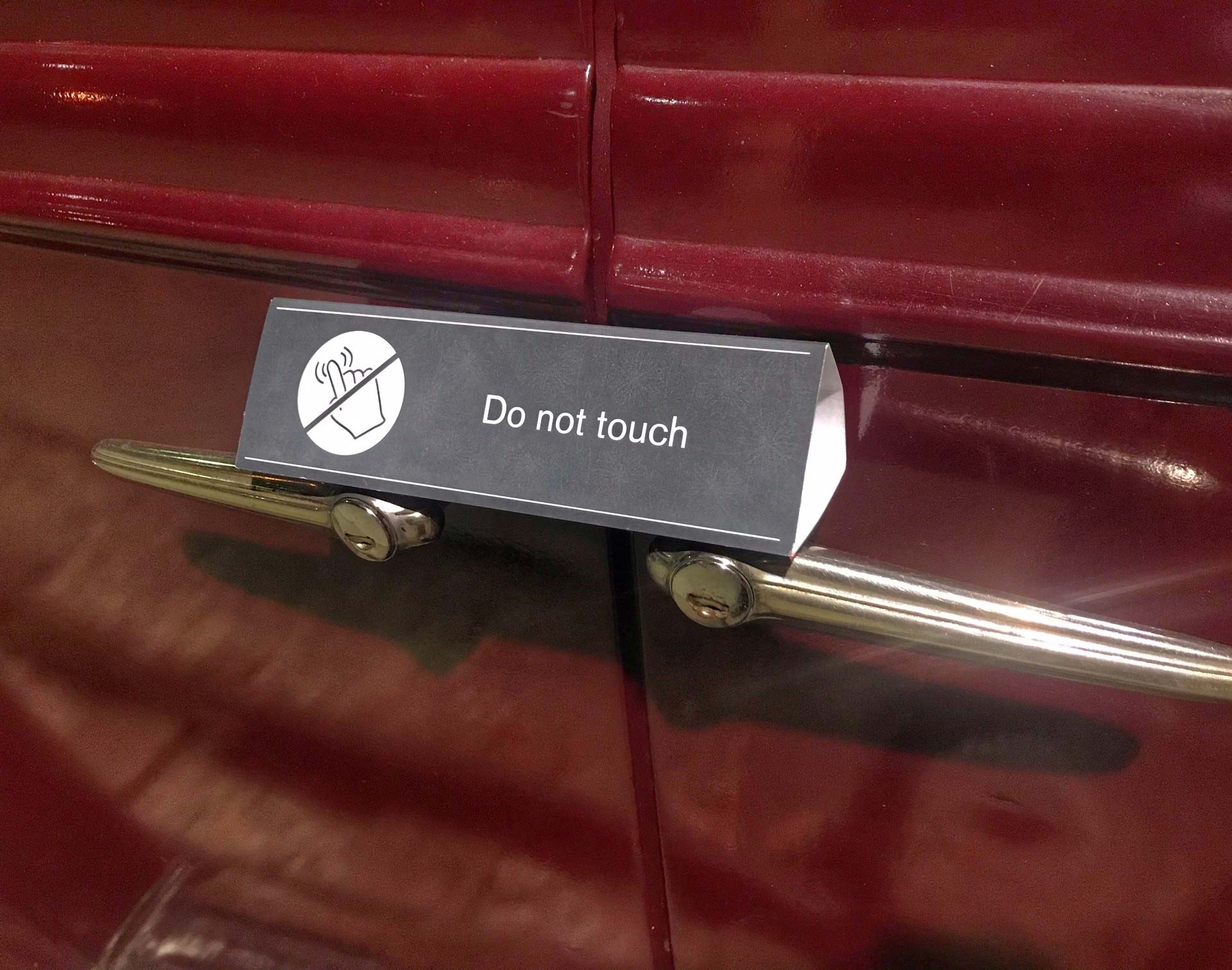 Museum Etiquette - Do not touch sign